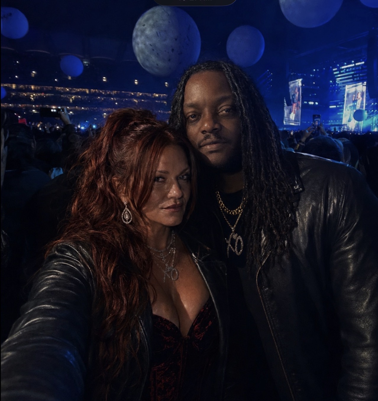 Finished Vesper Noir reconstruction of Laurie and James together beneath blue spheres at the Dublin concert